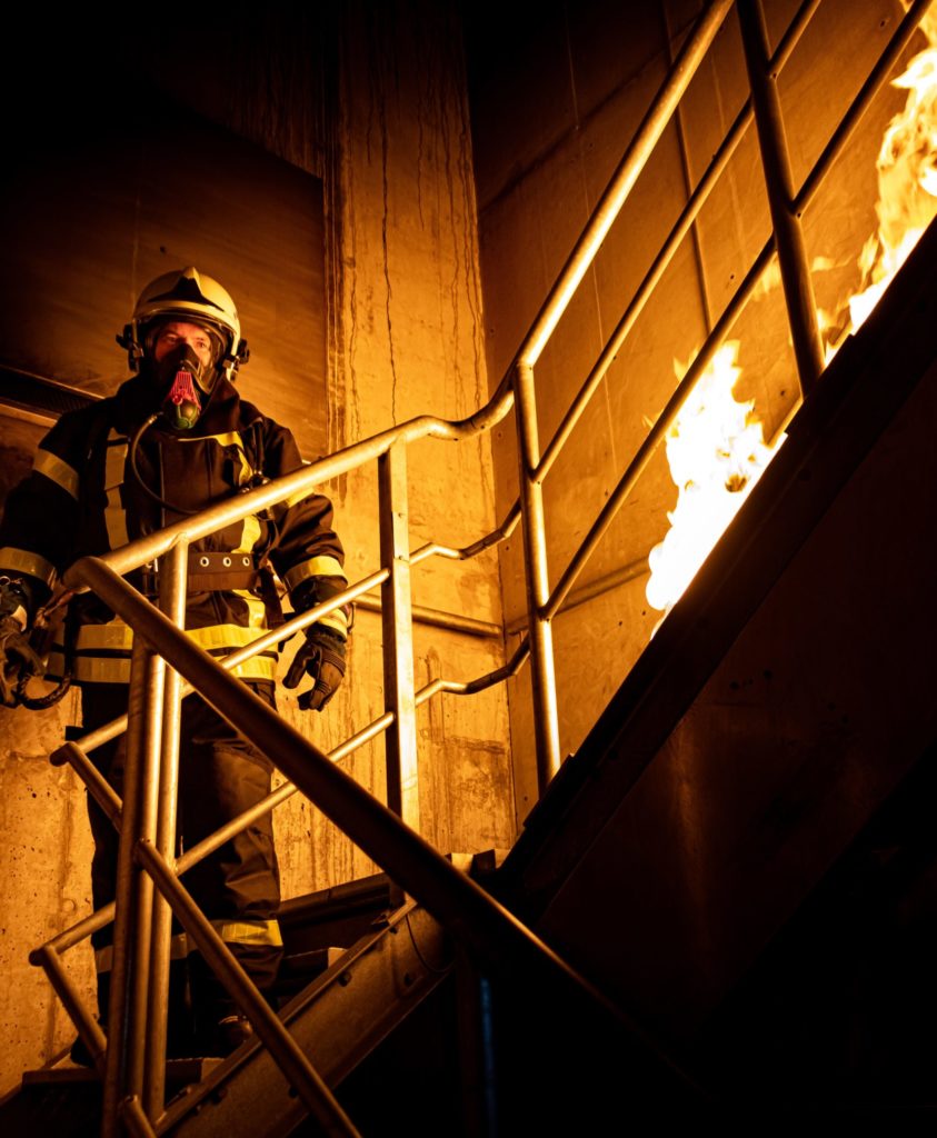 firefighter-standing-on-stairs-3448642